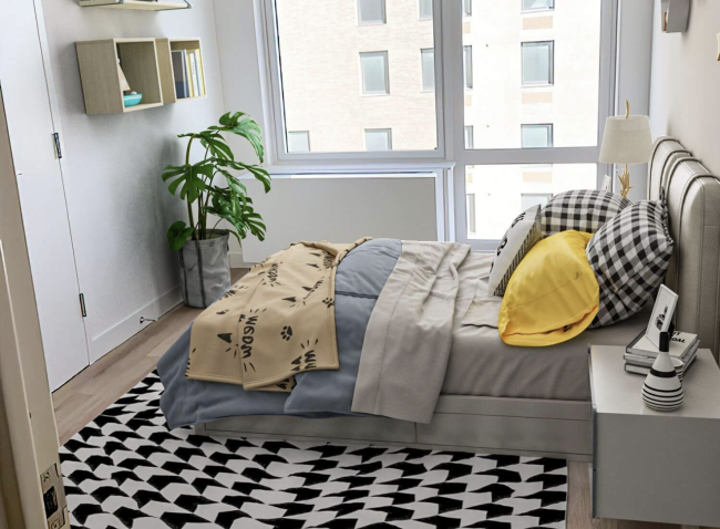 bedroom at apartment building in Rockaway Village, Queens with bed and building views